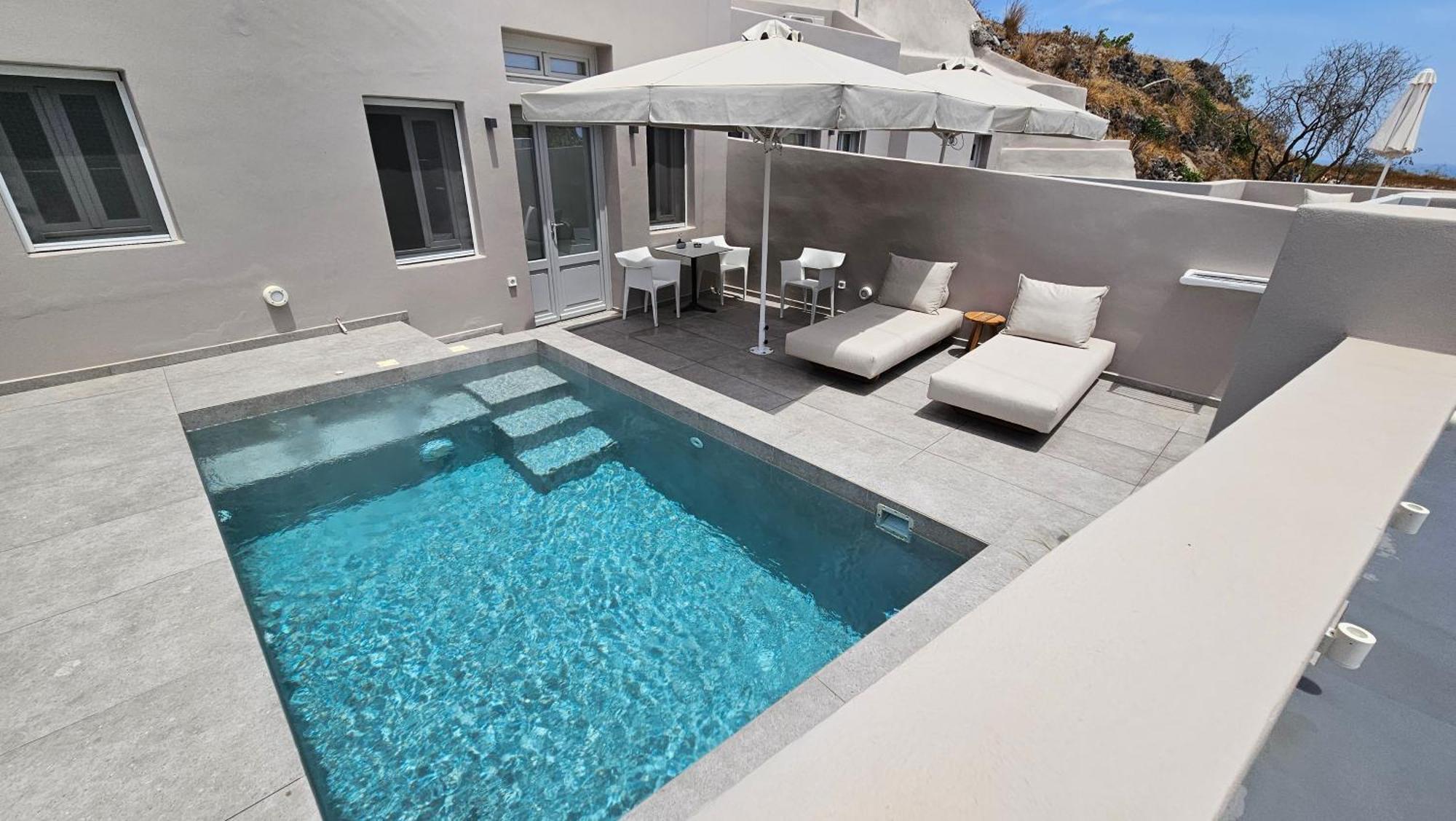 Petroma Cave Suites Vourvoulos Bilik gambar