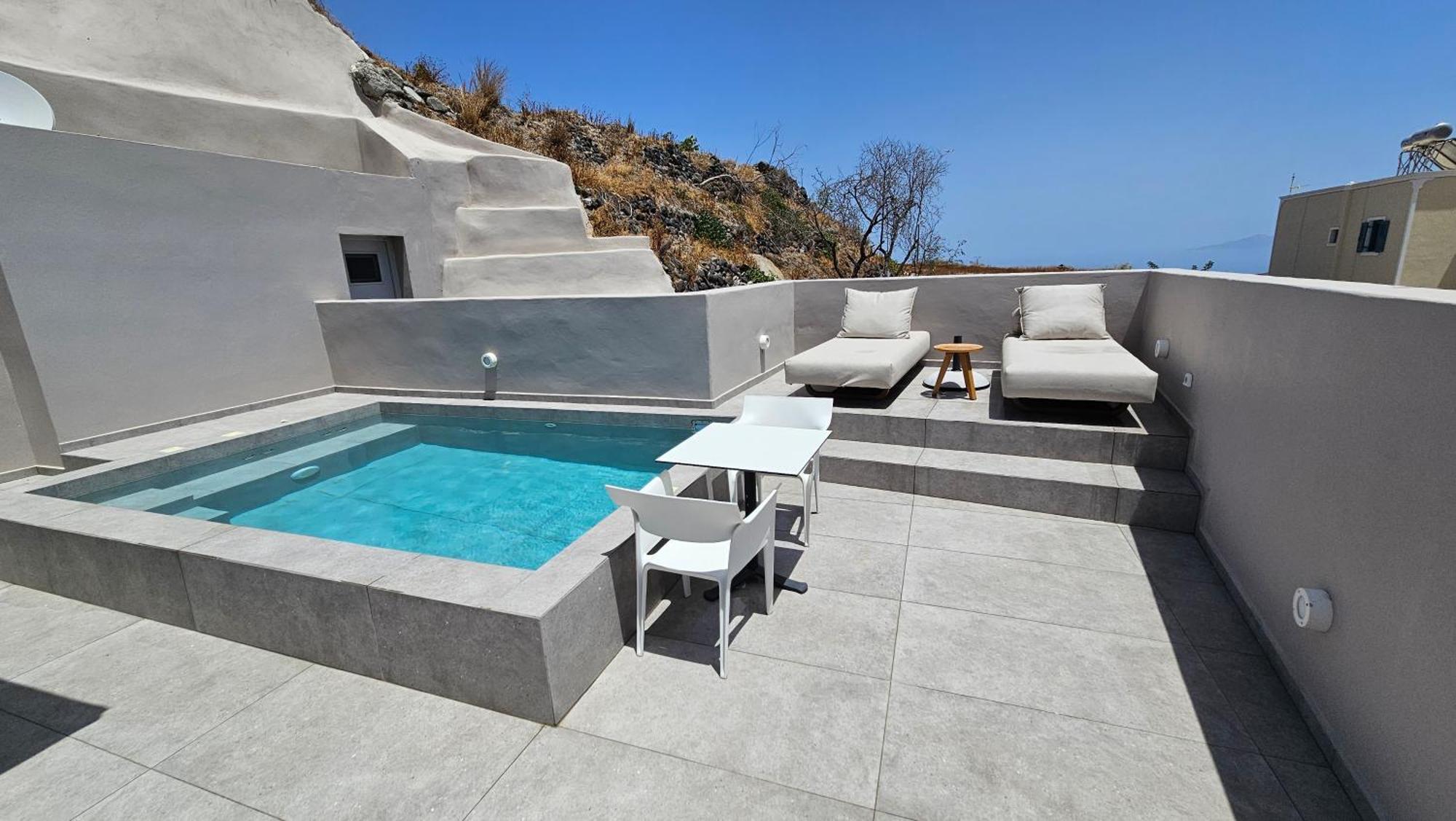 Petroma Cave Suites Vourvoulos Bilik gambar